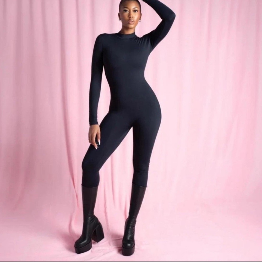 Stript black jumpsuit size large